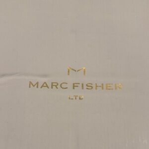 Marc Fisher Gold Logo Design